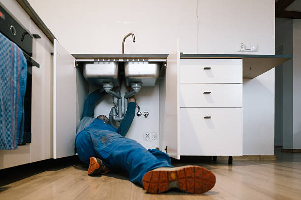 Professional Drain Cleaning technician working in Fischer, TX